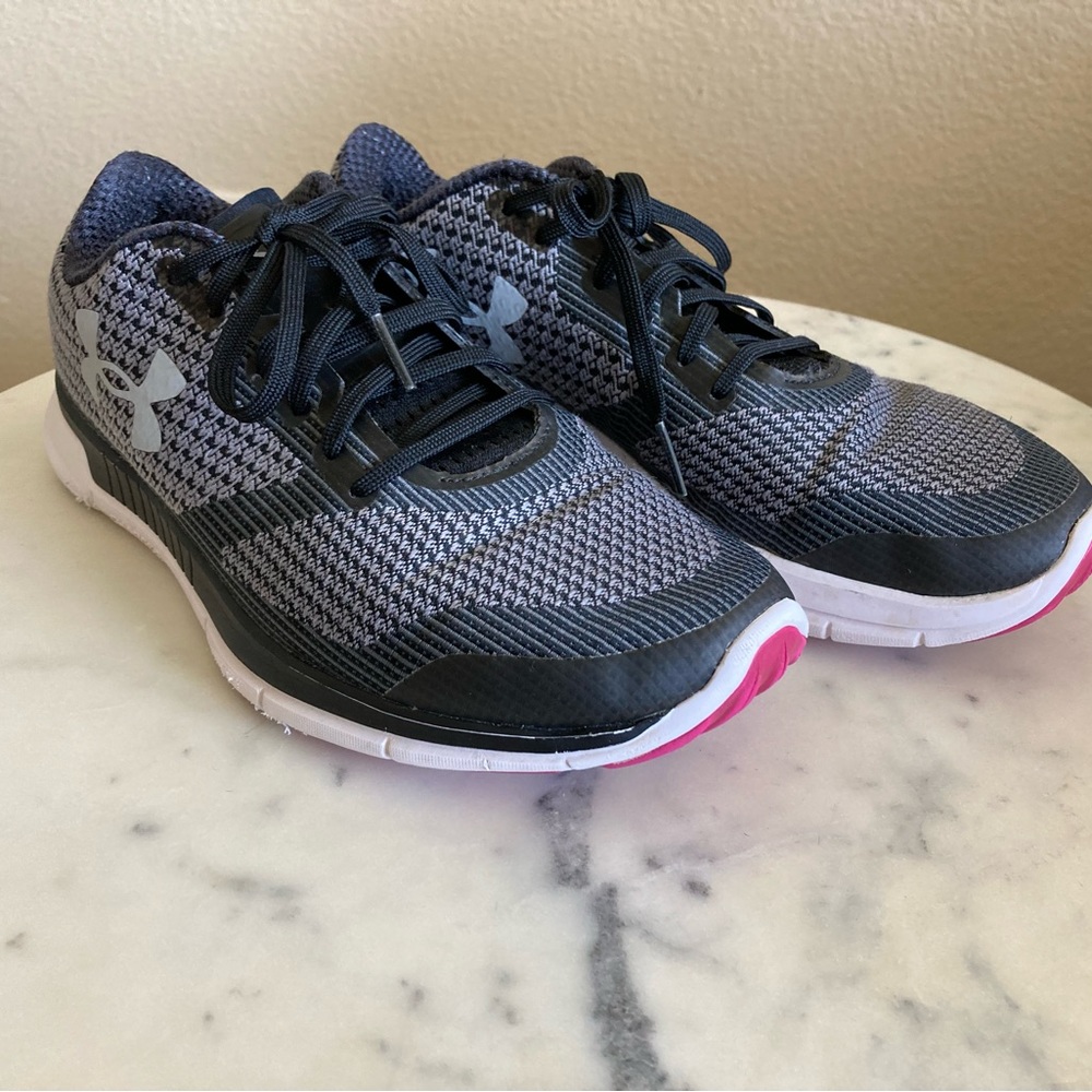 Women’s black Under Armour sneakers